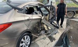 Ayvalık’ta iş makinesi ile otomobil çarpıştı: 1 çocuk ve 1 hamile kadın yaralandı