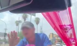 Gelin arabasının önüne atlayan genç, gelin ve damadı korkuttu