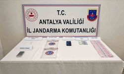 Araçta yapılan aramada 1 kilo 185 gram metamfetamin ele geçirdi