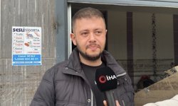 Sel sularında mahsur kalan anne kedi ve yavrularını esnaf kurtardı