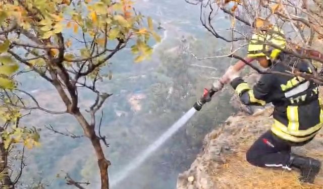 Makilikte çıkan yangın bahçelere ulaşmadan söndürüldü