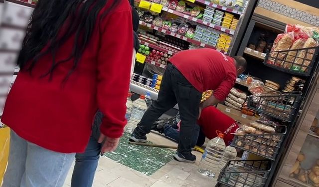 Markete giren fare paniğe neden oldu