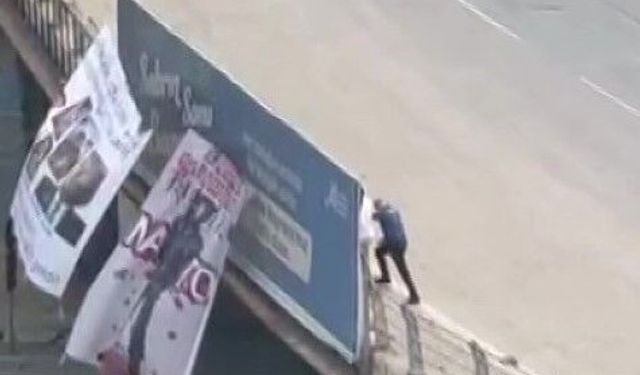 Adana'da köprüye NATO protestosu için pankart asan şahıs gözaltına alındı