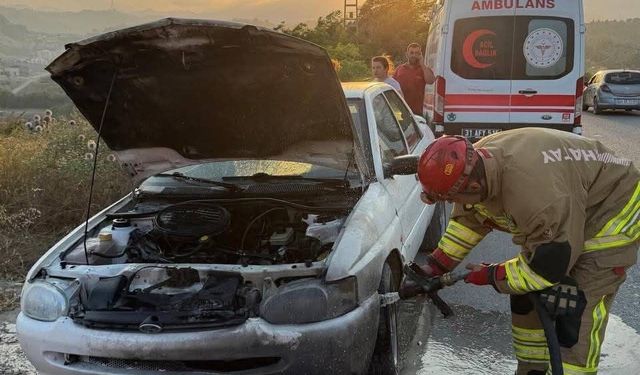Antakya'da otomobilin motorundan alevler yükseldi