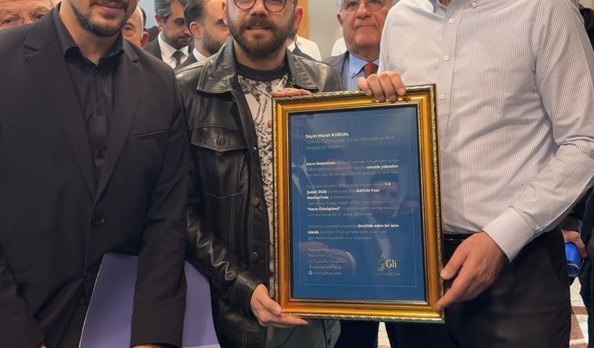 Bakan Kurum'a fuar davetiyesi takdim edildi